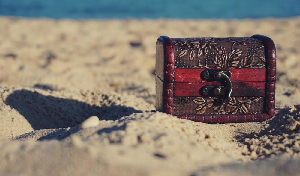 Small treasure chest on the beach