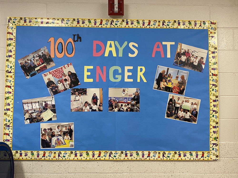 bulletin board that says "100 Days at Enger"