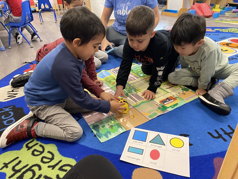 Students using the Coding BeeBot