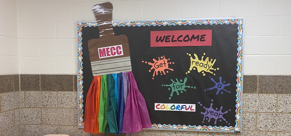 bulletin board with a 3D paintbrush that says "Welcome. Get ready for a colorful year."