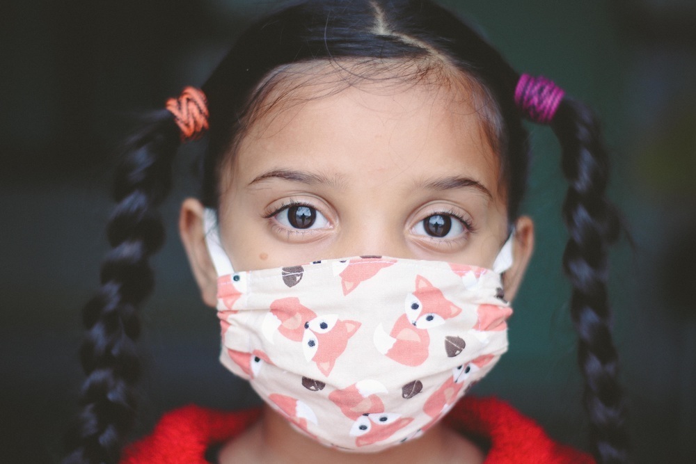 Child with mask