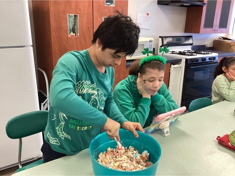 students making snack mix