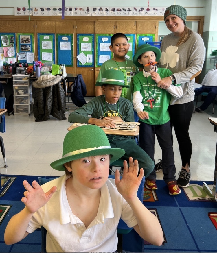students posing for camera in saint Patrick’s day attire